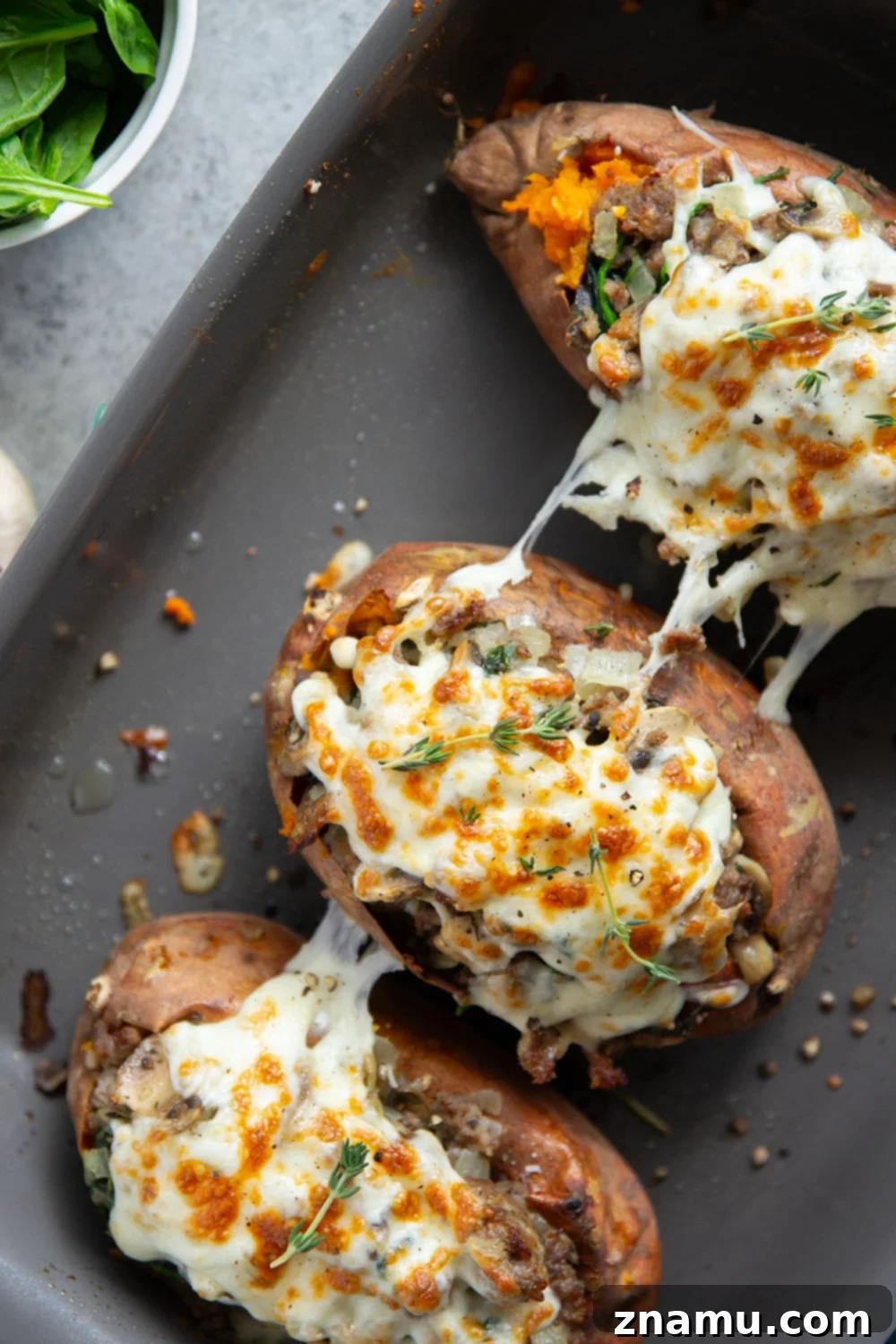 Sweet Potato Boats with Mushroom Sausage Filling 2 These mushroom sausage stuffed sweet potatoes feature a flavorful Italian sausage mushroom filling stuffed into fluffy baked sweet potatoes and baked with lots of gooey mozzarella on top.