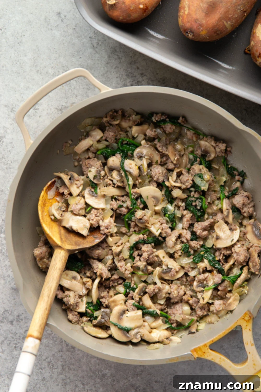 Sweet Potato Boats with Mushroom Sausage Filling 3 These mushroom sausage stuffed sweet potatoes feature a flavorful Italian sausage mushroom filling stuffed into fluffy baked sweet potatoes and baked with lots of gooey mozzarella on top.