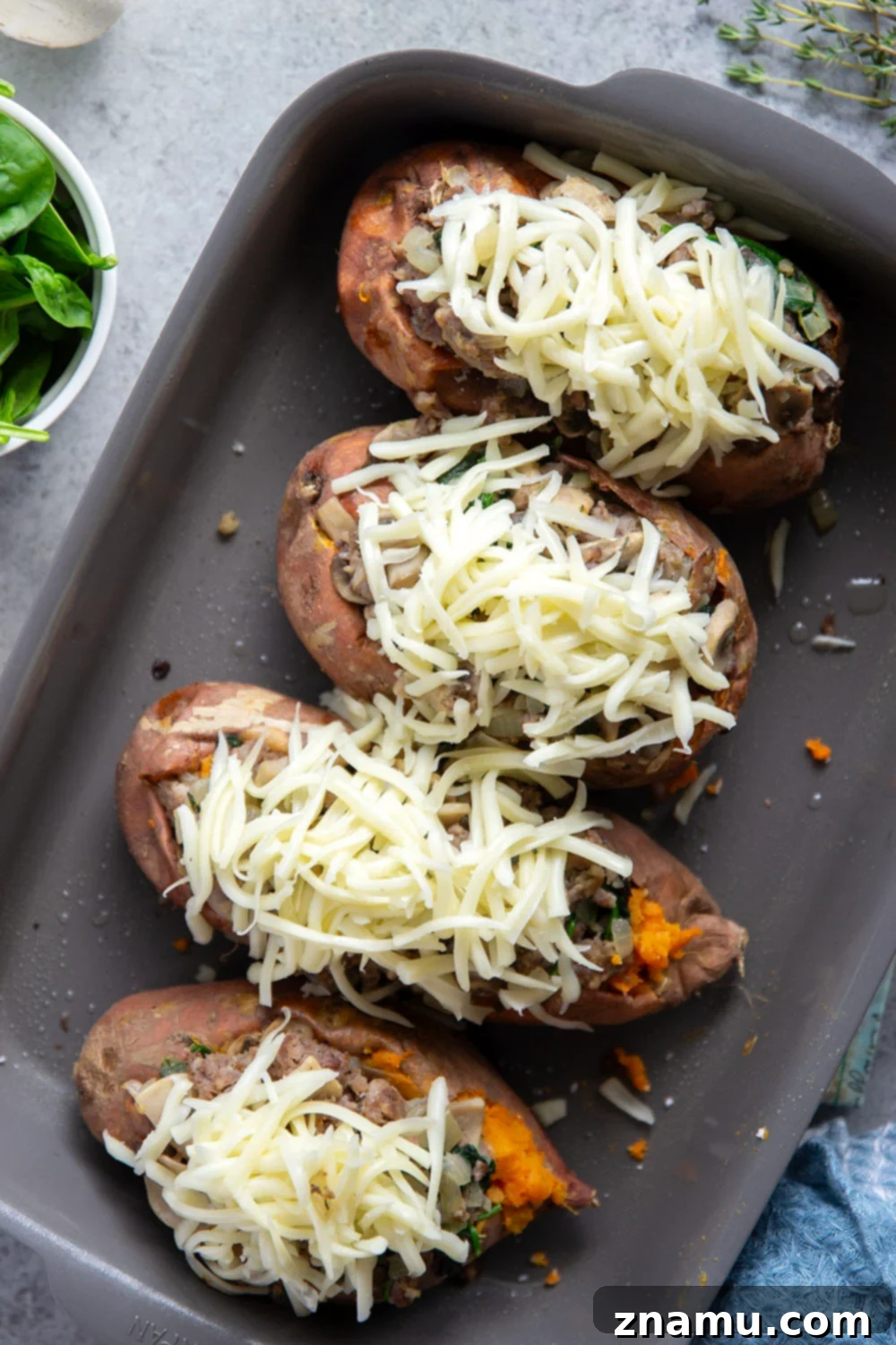 Sweet Potato Boats with Mushroom Sausage Filling 4 These mushroom sausage stuffed sweet potatoes feature a flavorful Italian sausage mushroom filling stuffed into fluffy baked sweet potatoes and baked with lots of gooey mozzarella on top.
