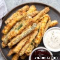 Golden Zucchini Sticks 8 You won't believe how crispy and flavorful these baked zucchini fries are! Easy to whip up in minutes and perfect for an abundance of zucchini.