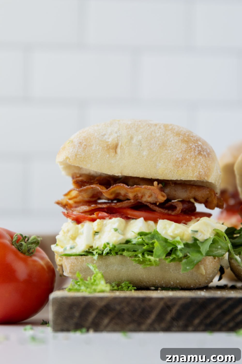 BLT Egg Salad Twist 2 Delicious BLT Egg Salad Sandwich with crispy bacon, fresh lettuce, and ripe tomatoes