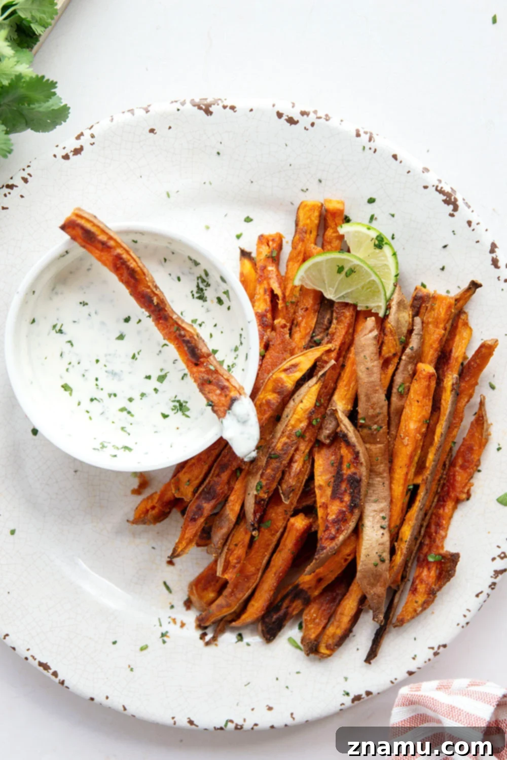 Blazing Sweet Potato Fries with Zesty Cilantro Ranch 6 Sweet and spicy sweet potato fries are perfectly crispy and go incredibly well with a creamy cilantro ranch sauce for dipping.
