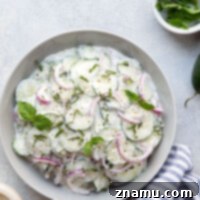 Velvety Basil Cucumber Delight 8 This basil cucumber salad features crisp cucumbers and red onion dressed in a flavorful sour cream dressing with lots of fresh basil.
