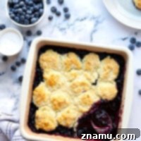 Ultimate Blueberry Cobbler 8 This classic blueberry cobbler features a jammy blueberry filling topped with a sweet, buttery biscuit topping. It truly is the best summer dessert warm from the oven with a scoop of whipped cream or ice cream!