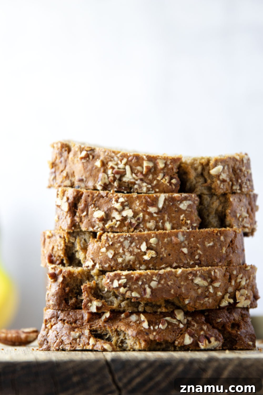 The Ultimate Banana Bread 6 Beautifully sliced banana bread, showcasing its fluffy texture and inviting aroma.
