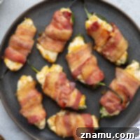 Crispy Bacon & Cream Cheese Jalapeño Bites 8 Wrapped in crispy brown sugar bacon and filled with a rich cheddar cream cheese filling, these bacon wrapped jalapeno poppers are the ultimate sweet and savory appetizer!