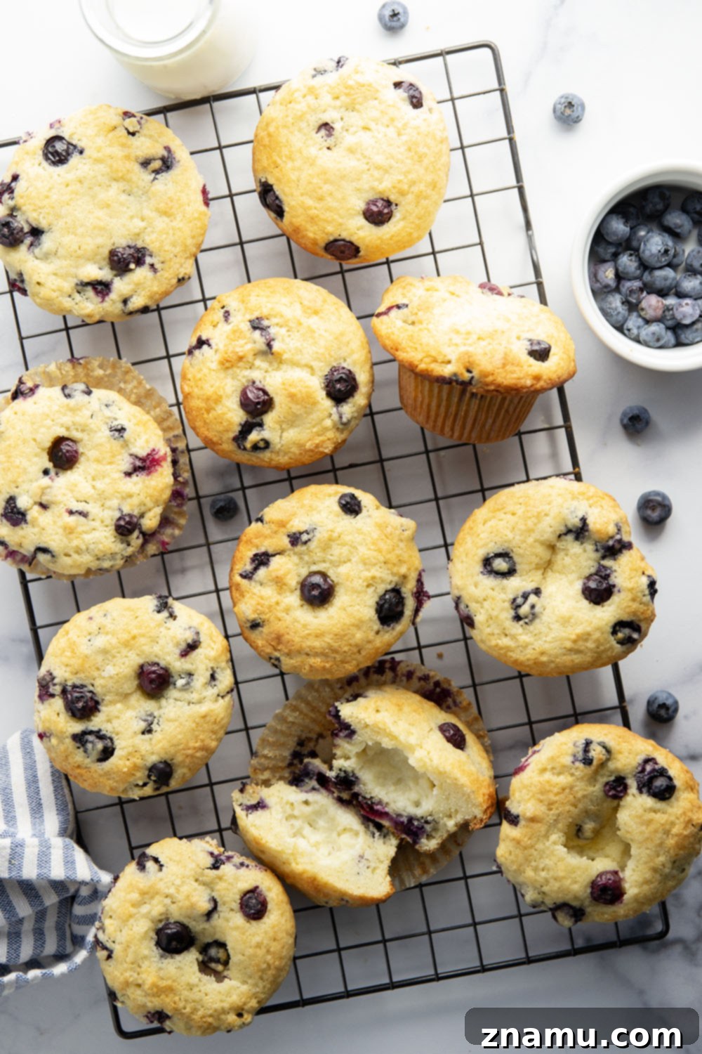 Blueberry Muffins with Cream Cheese Swirl 6 Super soft and moist blueberry cream cheese muffins with a rich cheesecake center and lots of juicy blueberries in every bite.
