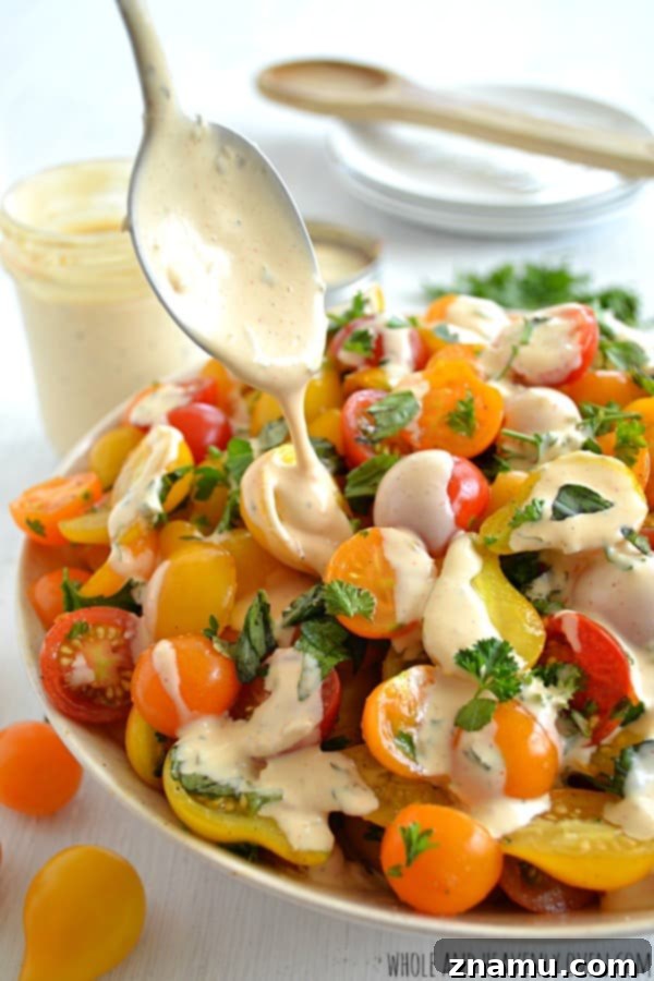 Reliving Summer 2014 10 A vibrant Herbed Cherry Tomato Salad with Buttermilk Ranch Dressing, showcasing fresh ingredients.
