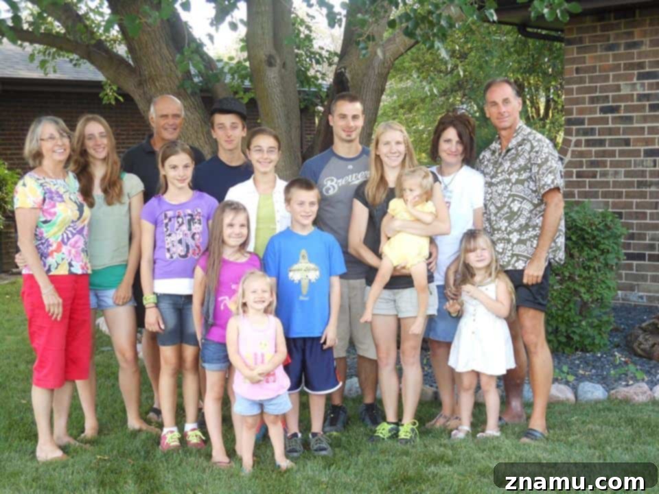 Reliving Summer 2014 12 Family gathered together, smiling and enjoying their time at a great-aunt and uncle's house in Chicago.