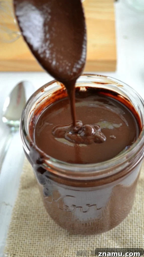 Reliving Summer 2014 18 A scoop of rich vanilla ice cream generously drizzled with decadent homemade hot fudge sauce.
