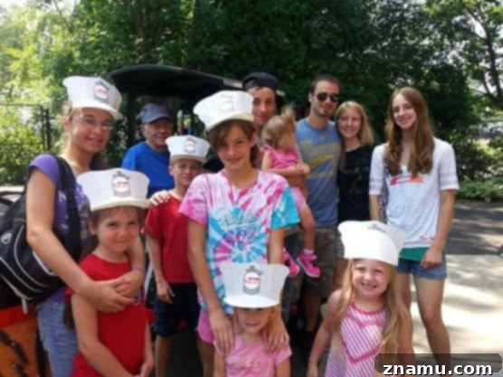 Reliving Summer 2014 21 Family members, including adults and children, enjoying a day at the Henry Vilas Zoo in Madison.