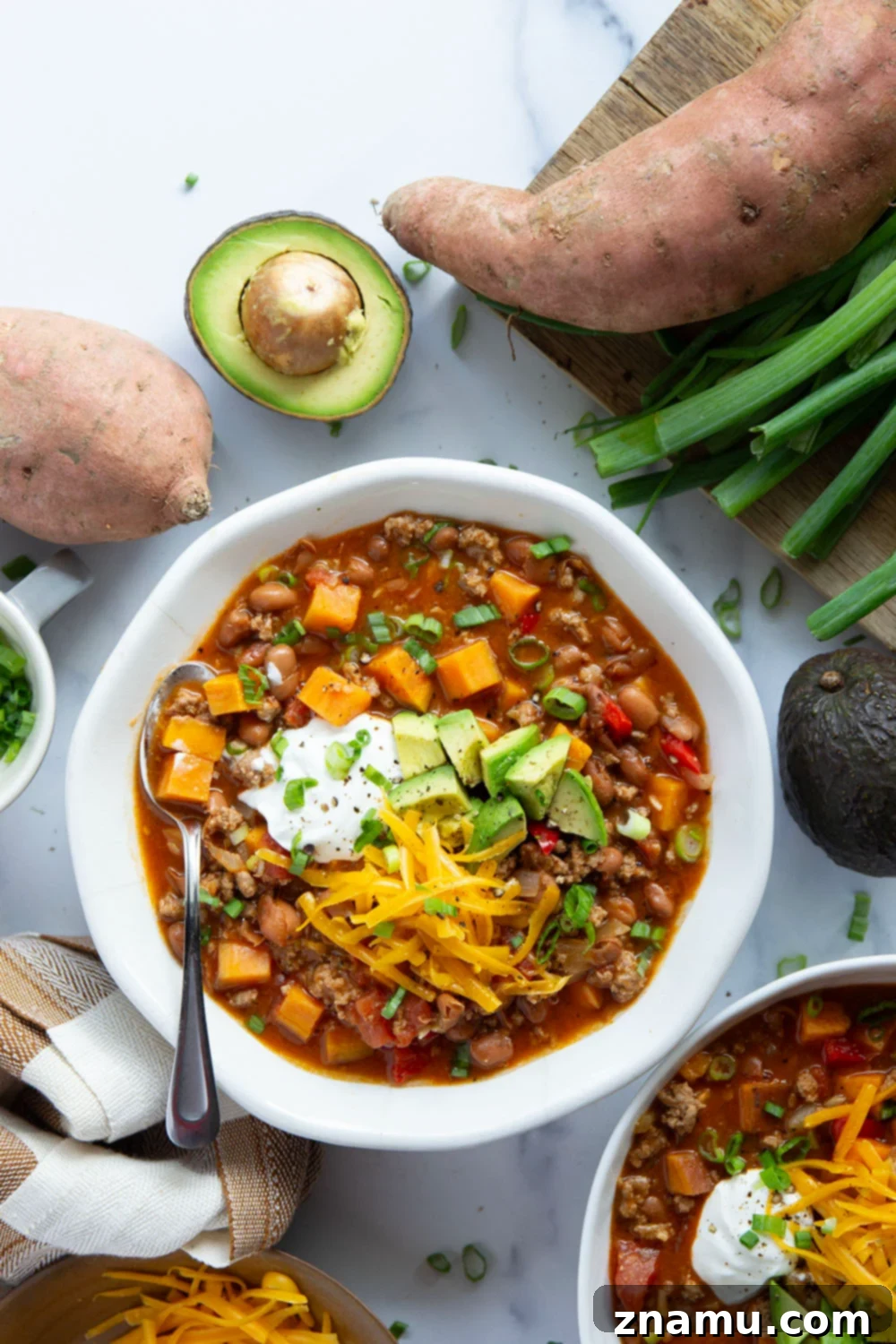 A close-up of delicious Sweet Potato Turkey Chili with sweet potatoes and ground turkey