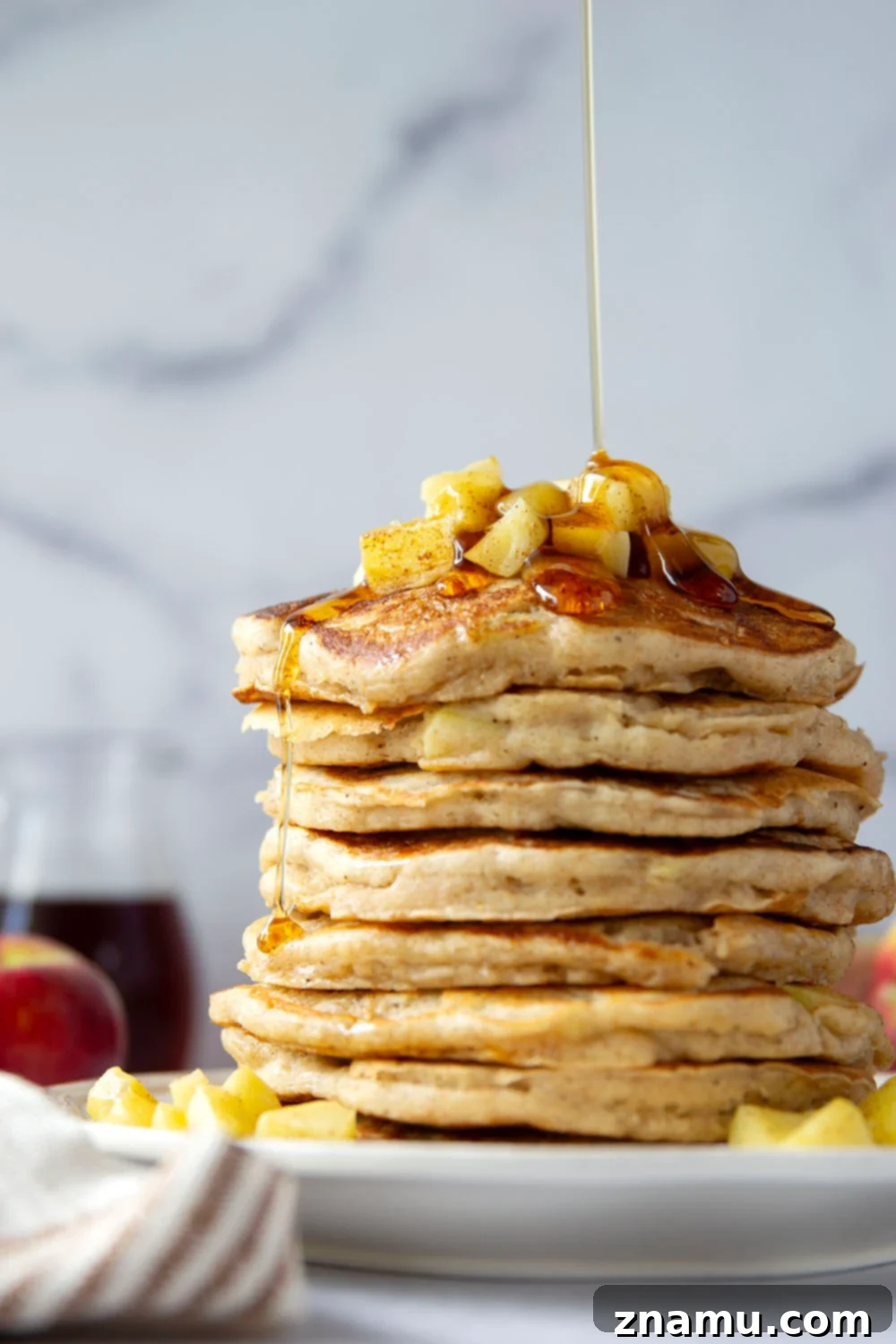 Fluffy Apple Ricotta Pancakes 2 These apple ricotta pancakes are the ultimate fall breakfast! Ricotta cheese gives them an incredible light and fluffy texture while sautéed apples and lots of spices give them the perfect touch of fall.
