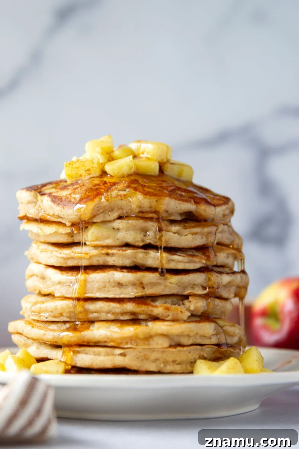 Fluffy Apple Ricotta Pancakes 5 These apple ricotta pancakes are the ultimate fall breakfast! Ricotta cheese gives them an incredible light and fluffy texture while sautéed apples and lots of spices give them the perfect touch of fall.