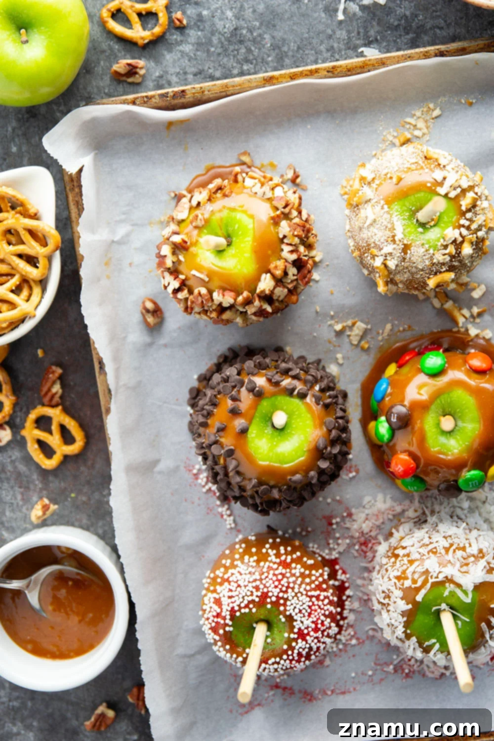 Gourmet Hand-Dipped Caramel Apples 2 Dipped in a rich homemade caramel sauce and coated in a variety of fun toppings, these homemade caramel apples truly are the deluxe version of a fall classic!