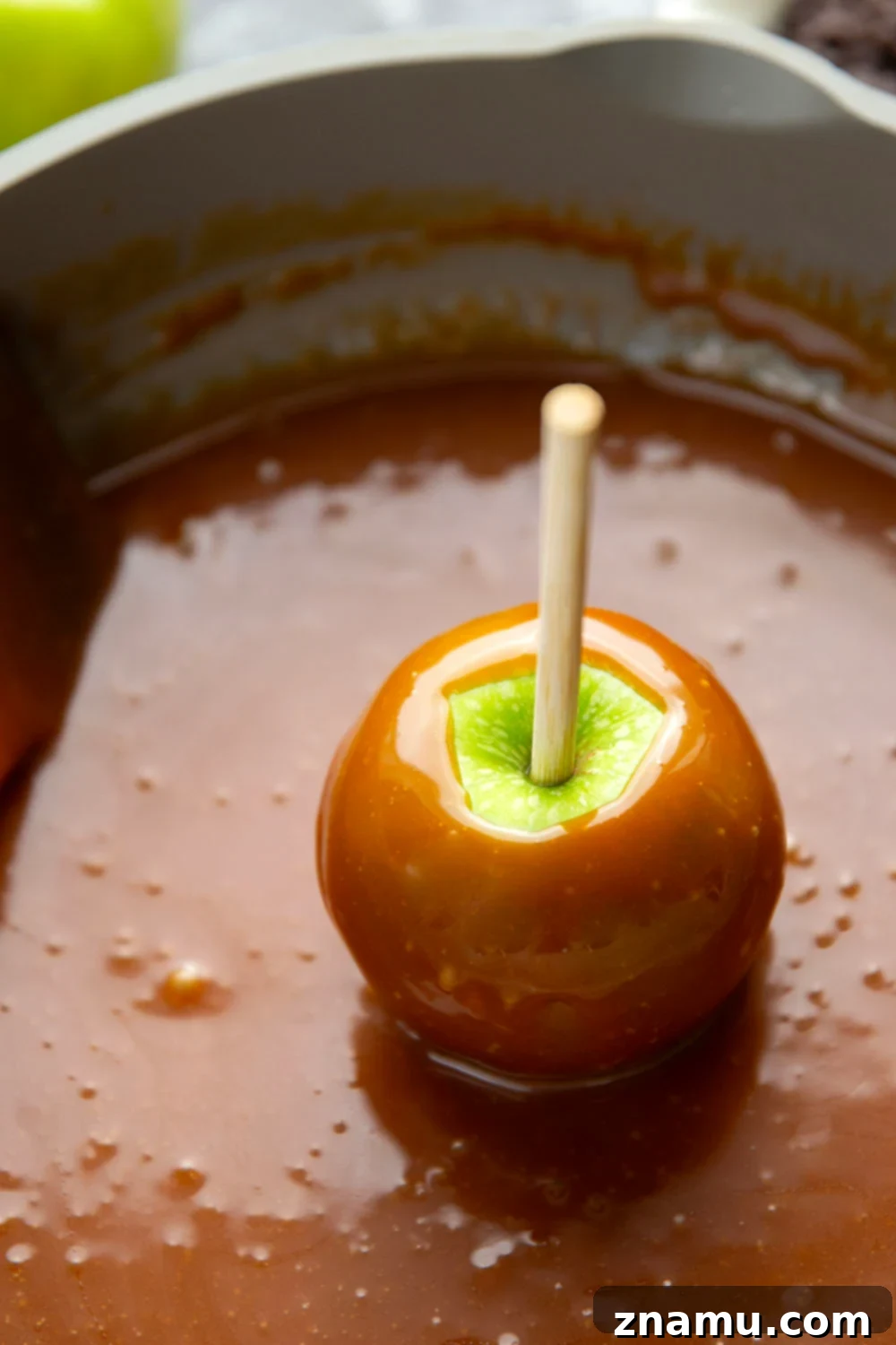 Gourmet Hand-Dipped Caramel Apples 4 Dipped in a rich homemade caramel sauce and coated in a variety of fun toppings, these homemade caramel apples truly are the deluxe version of a fall classic!