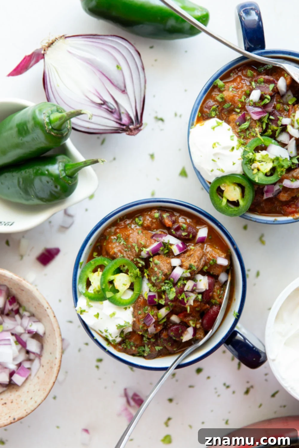 Fiery Steak Chili 2 Thick and chunky steak chili features fall-apart tender steak cubes, lots of hearty beans, and the perfect amount of zippy heat from jalapenos.