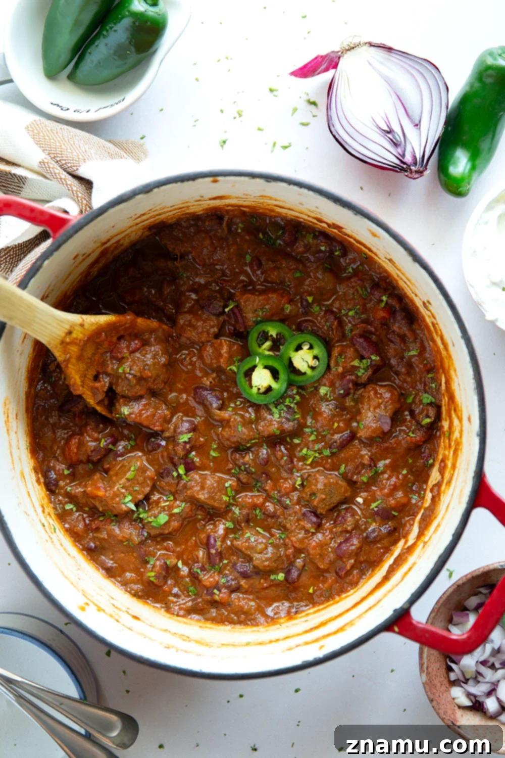 Fiery Steak Chili 3 Thick and chunky steak chili features fall-apart tender steak cubes, lots of hearty beans, and the perfect amount of zippy heat from jalapenos.