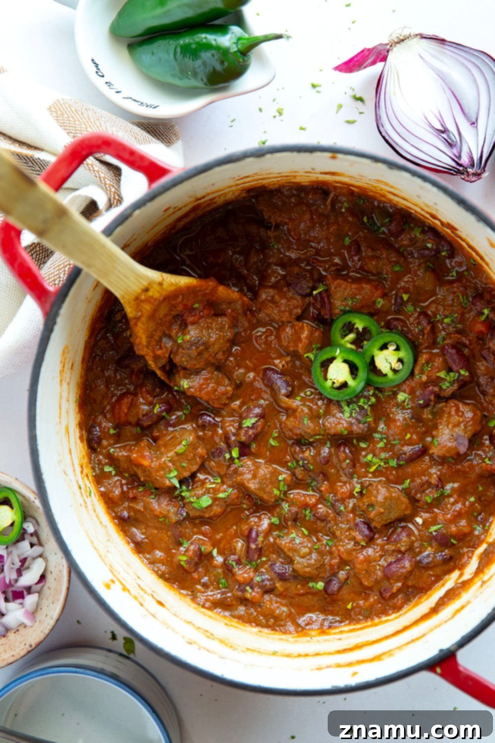 Fiery Steak Chili 5 Thick and chunky steak chili features fall-apart tender steak cubes, lots of hearty beans, and the perfect amount of zippy heat from jalapenos.