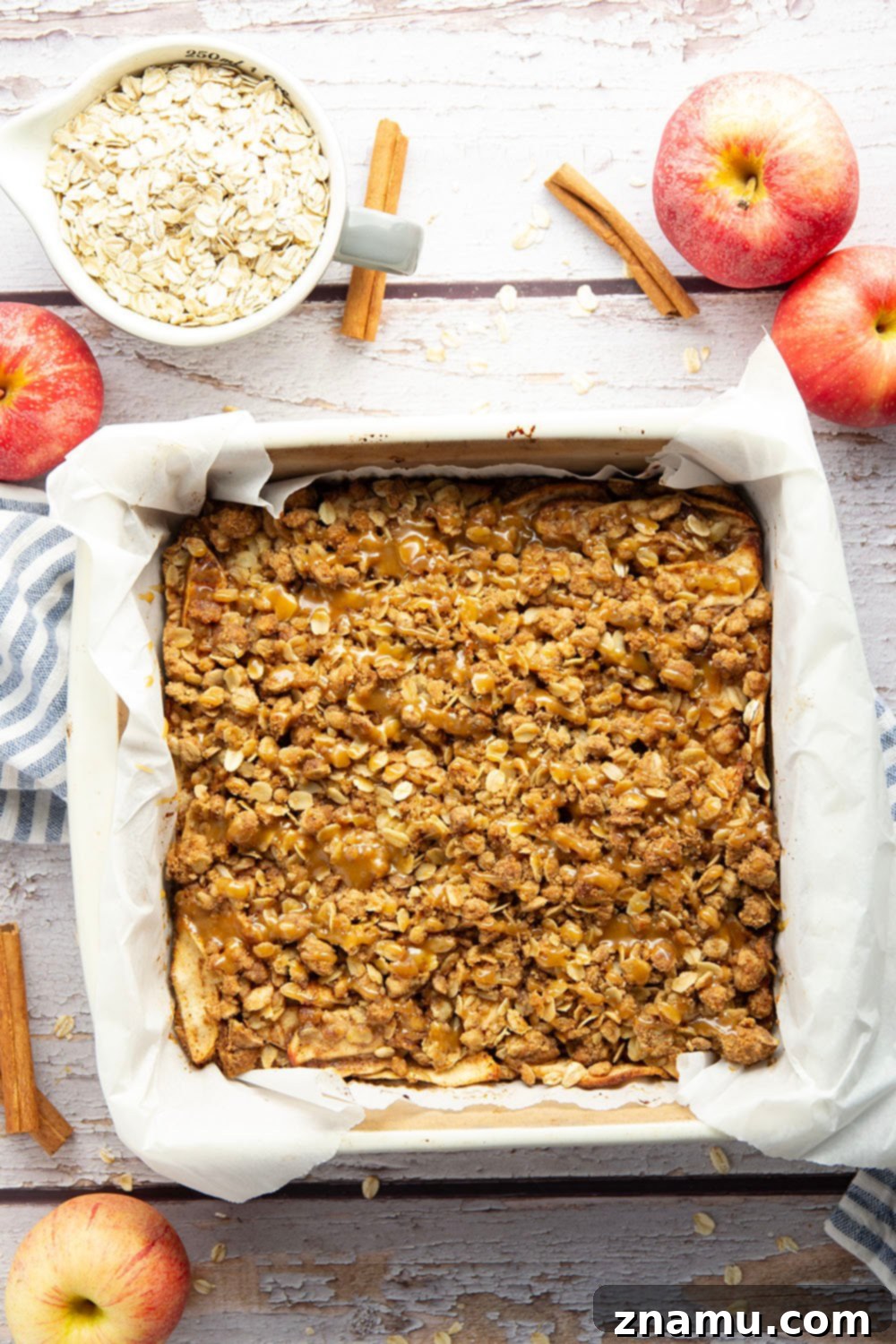 Autumn Apple Crumble Bars 3 Close-up of golden brown Apple Crisp Bars, showcasing the crumbly streusel topping and rich apple filling.