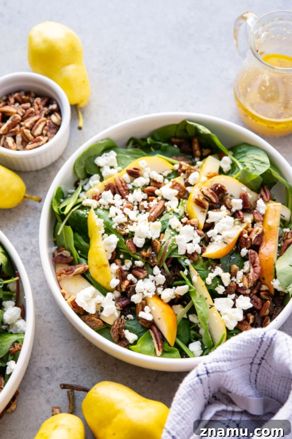 Sweet Pear and Creamy Goat Cheese Salad 3 Loaded with sweet pear slices, tangy goat cheese, and lots of toasted pecans, this pear goat cheese salad is the perfect fall salad!