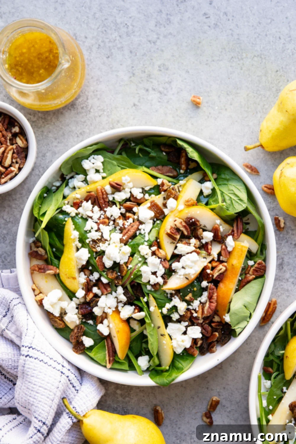 Sweet Pear and Creamy Goat Cheese Salad 6 Loaded with sweet pear slices, tangy goat cheese, and lots of toasted pecans, this pear goat cheese salad is the perfect fall salad!