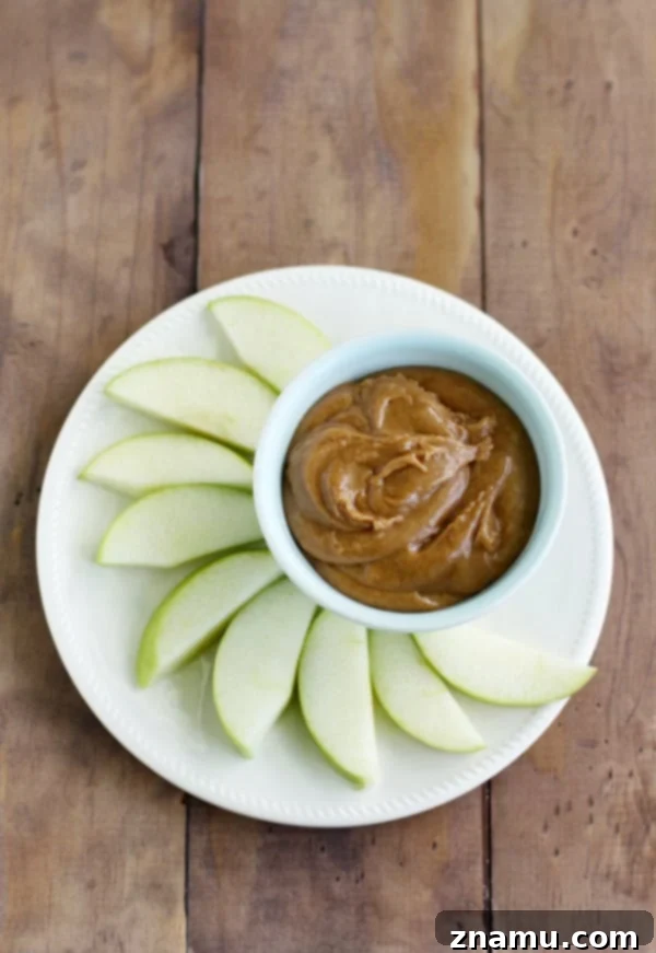 Super simple fall recipe - crisp apples paired with a sweet, creamy cinnamon almond butter dip for an irresistible snack.