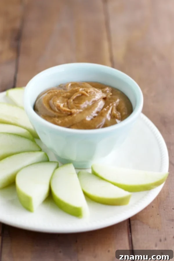 Easy almond butter apple dip recipe requiring just five ingredients, perfect for a quick, healthy snack.