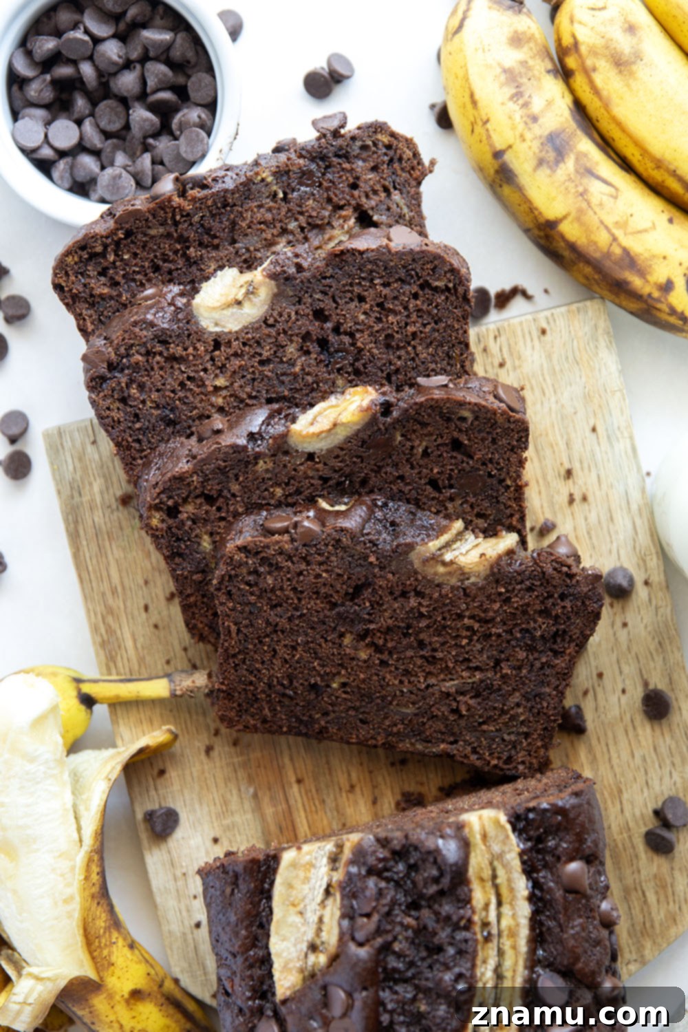 Decadent Double Chocolate Banana Bread 5 Ingredients for double chocolate banana bread laid out on a kitchen counter.