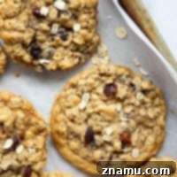 These soft and chewy oatmeal raisin cookies are definitely a keeper recipe! Crisp on the outsides and perfectly soft and chewy inside with lots of tender raisins and oats.