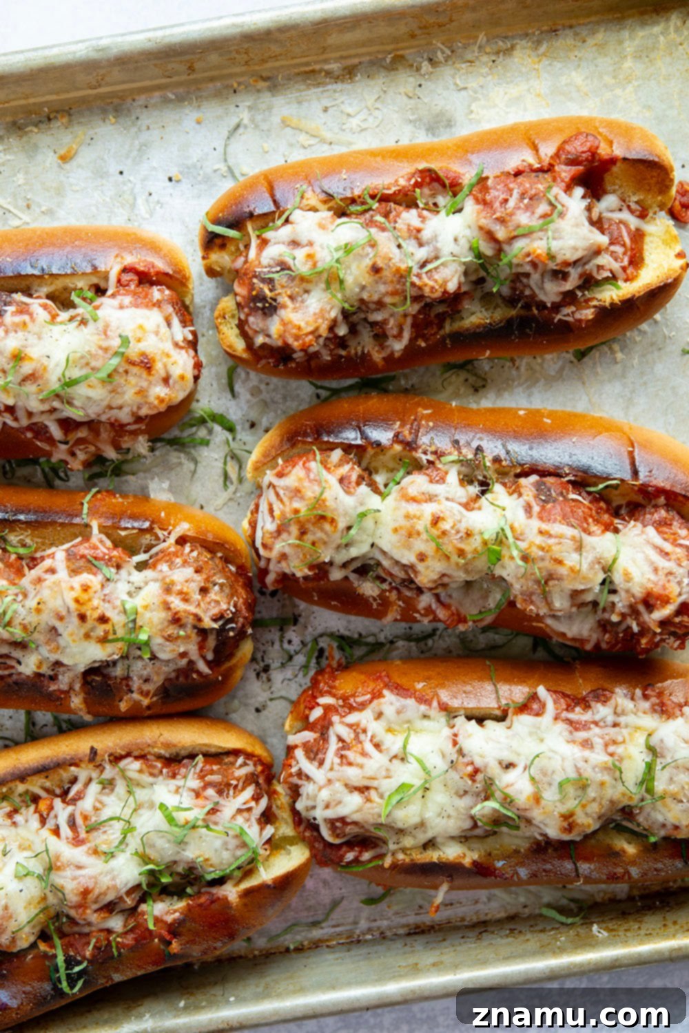 Mouthwatering Italian Meatball Subs 4 Juicy meatballs are simmered in flavorful marinara sauce and baked with two kinds of cheese on top in these easy Italian meatball subs!