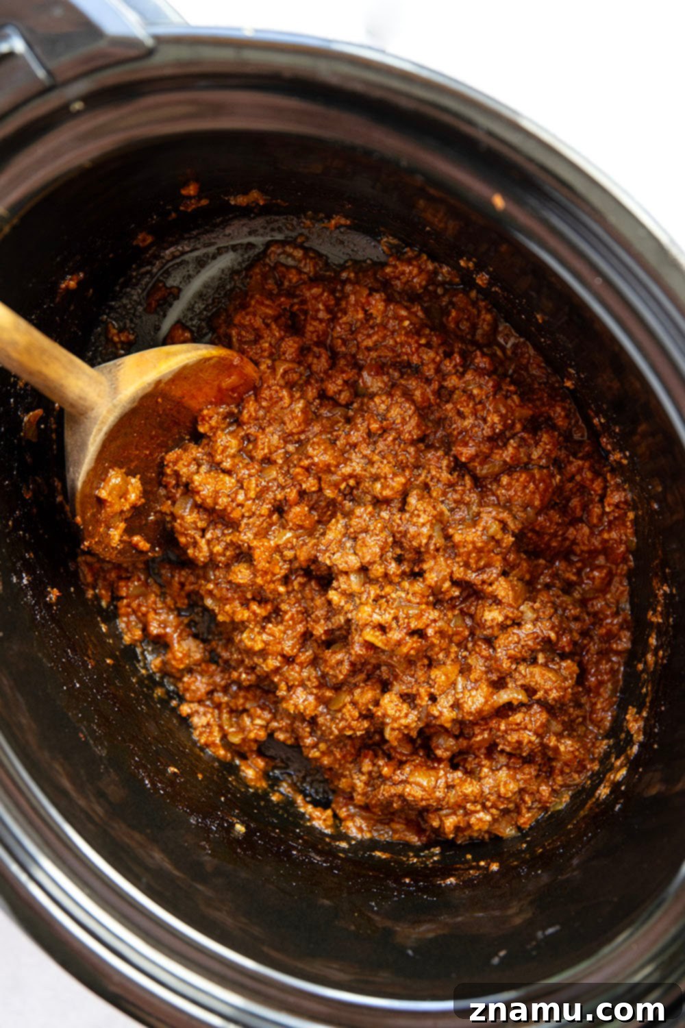Effortless Slow Cooker Sloppy Joes 3 Close-up of slow cooker sloppy joes mixture, showcasing the rich sauce and tender beef.