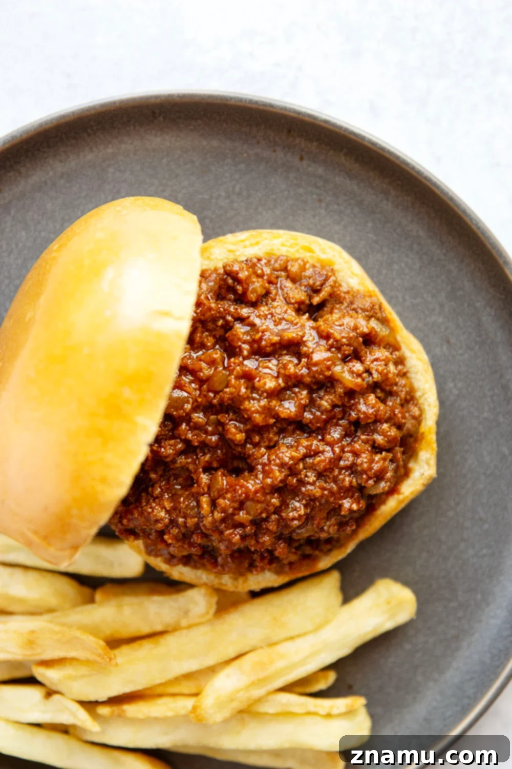 Effortless Slow Cooker Sloppy Joes 4 Slow cooker sloppy joes, closeup of the mixture in a slow cooker.