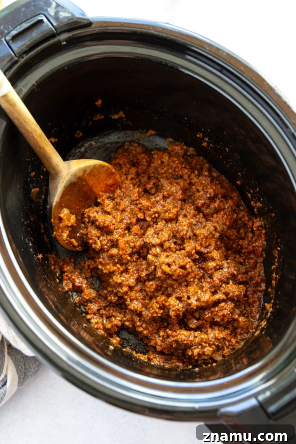 Effortless Slow Cooker Sloppy Joes 5 Slow cooker sloppy joes in a bowl, ready to be put on buns.