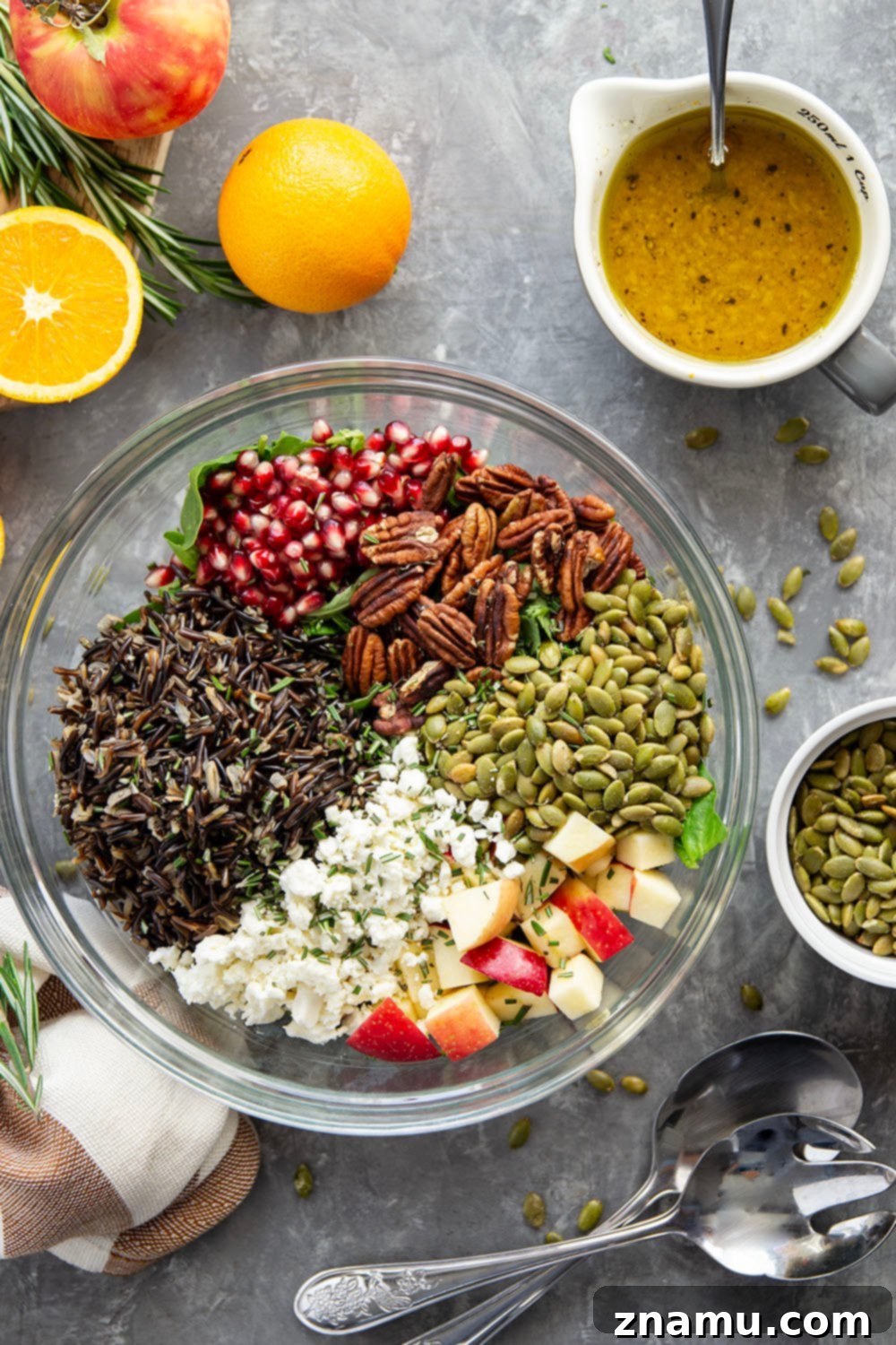 Close-up of Harvest Wild Rice Salad ingredients mixed with maple orange dressing
