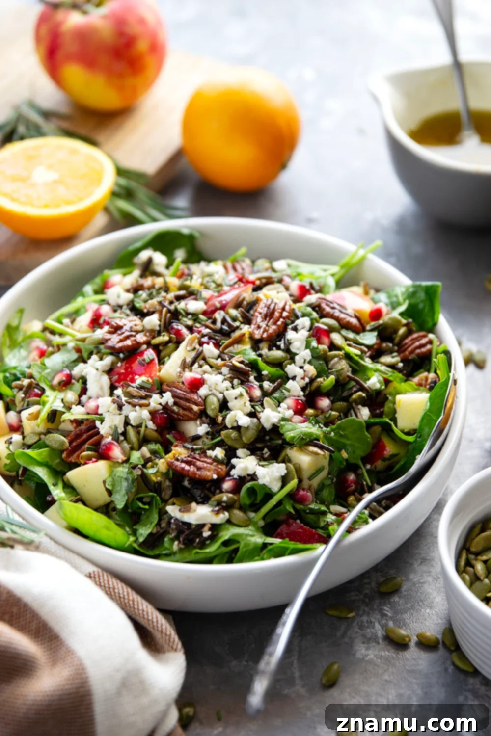 Close-up of Harvest Wild Rice Salad with a fork, showing the texture and freshness