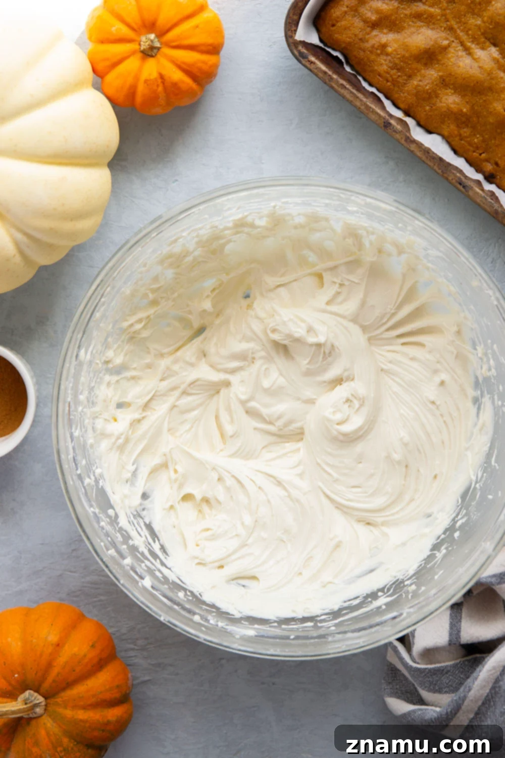 Spiced Pumpkin Sheet Cake 3 Creamy pumpkin and plenty of fall spices shine through in this super soft pumpkin sheet cake that gets frosted in a silky cream cheese frosting and is big enough to serve a crowd.