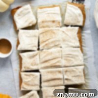 Spiced Pumpkin Sheet Cake 8 Creamy pumpkin and plenty of fall spices shine through in this super soft pumpkin sheet cake that gets frosted in a silky cream cheese frosting and is big enough to serve a crowd.