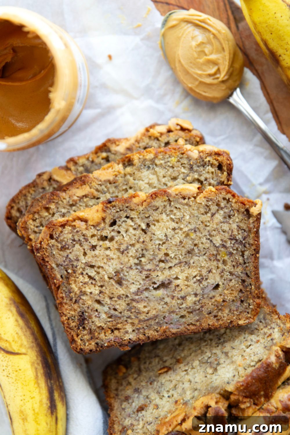 Nutty Banana Bread Bliss 4 Close-up shot of the irresistible peanut butter banana bread, showcasing its golden crust and inviting texture.