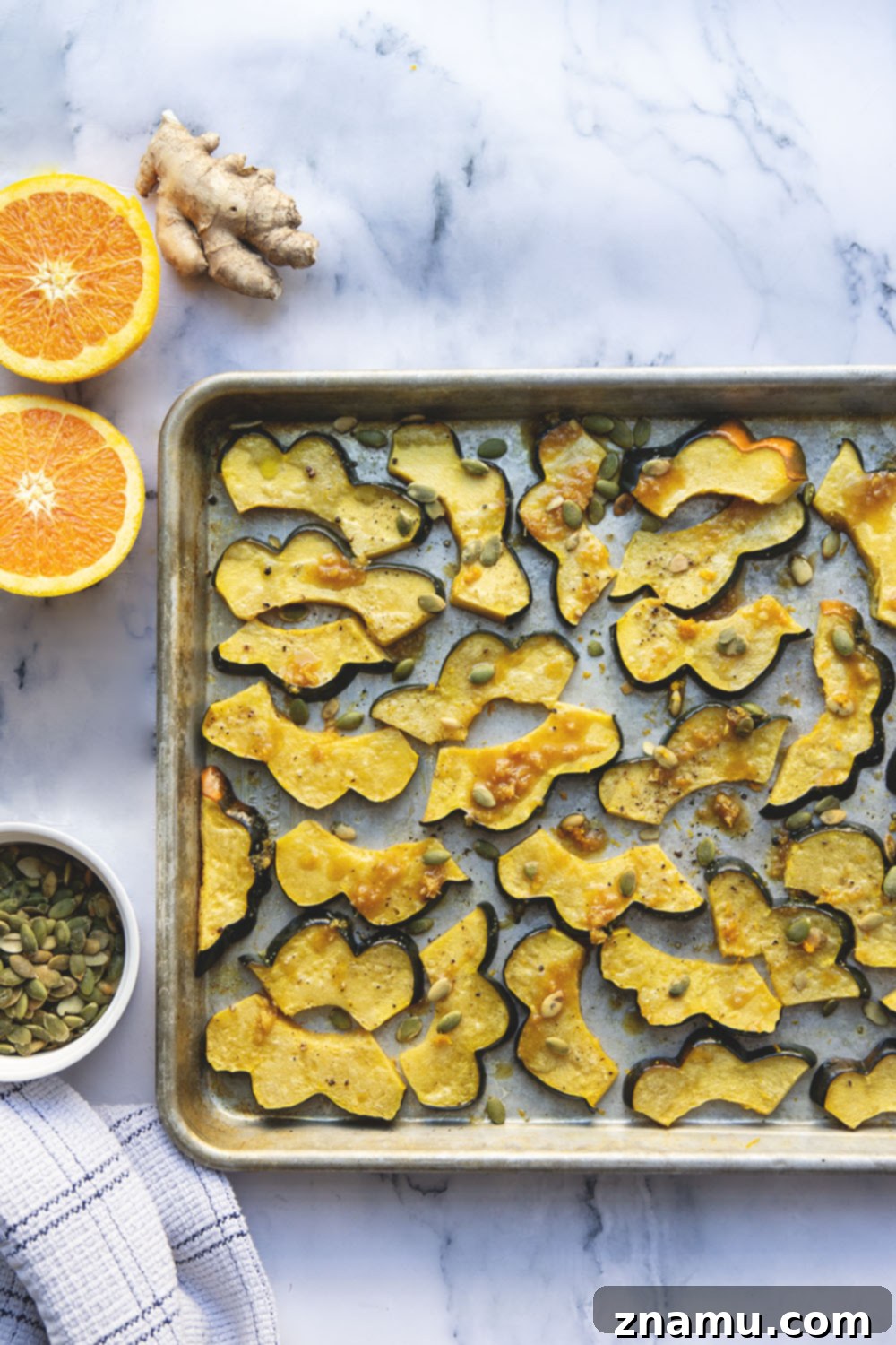 Sticky Ginger Orange Acorn Squash 3 Roasted until perfectly tender and drizzled with a flavorful fresh ginger orange glaze, this orange glazed acorn squash is the perfect fall side dish and so easy to pull together!
