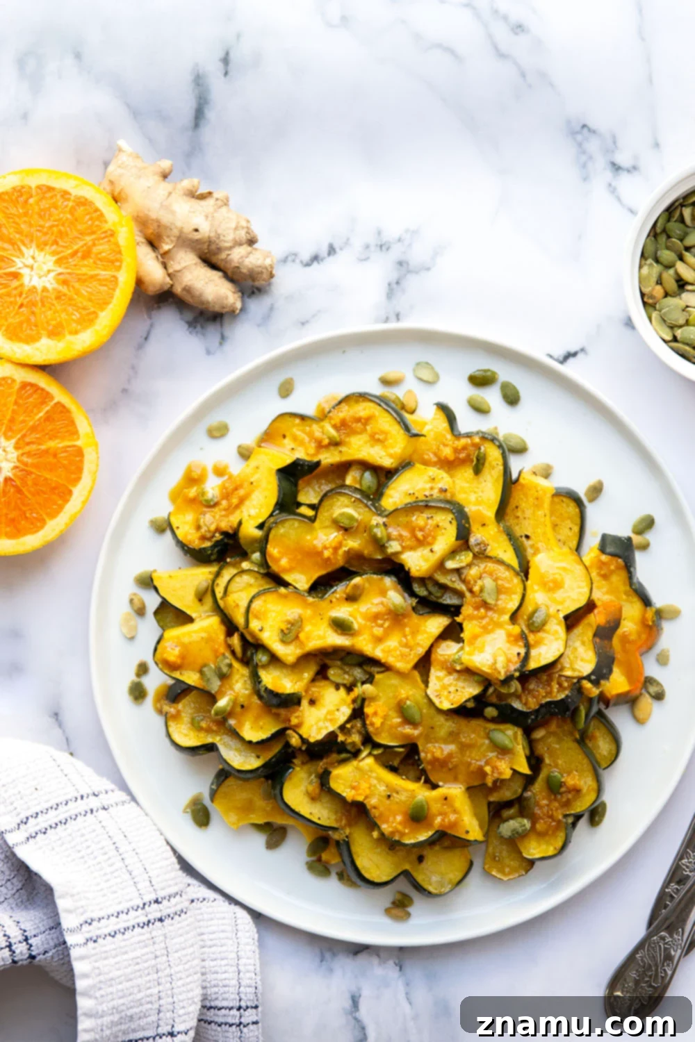 Sticky Ginger Orange Acorn Squash 4 Roasted until perfectly tender and drizzled with a flavorful fresh ginger orange glaze, this orange glazed acorn squash is the perfect fall side dish and so easy to pull together!