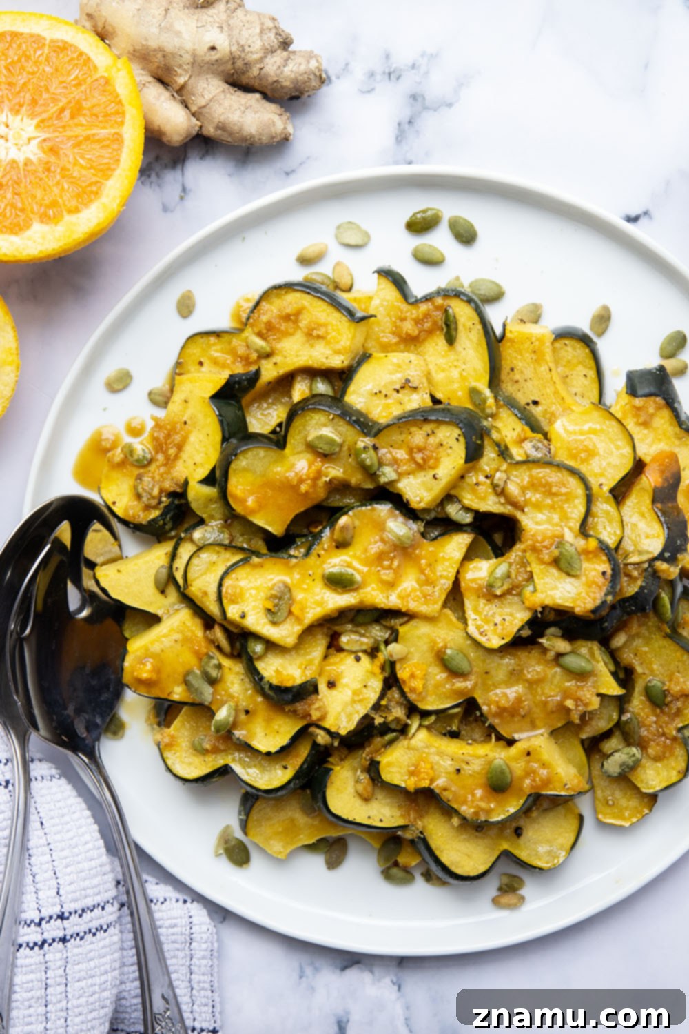 Sticky Ginger Orange Acorn Squash 5 Roasted until perfectly tender and drizzled with a flavorful fresh ginger orange glaze, this orange glazed acorn squash is the perfect fall side dish and so easy to pull together!