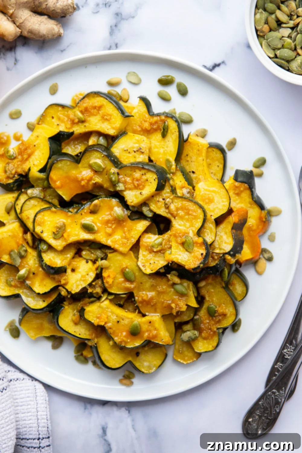 Sticky Ginger Orange Acorn Squash 6 Roasted until perfectly tender and drizzled with a flavorful fresh ginger orange glaze, this orange glazed acorn squash is the perfect fall side dish and so easy to pull together!