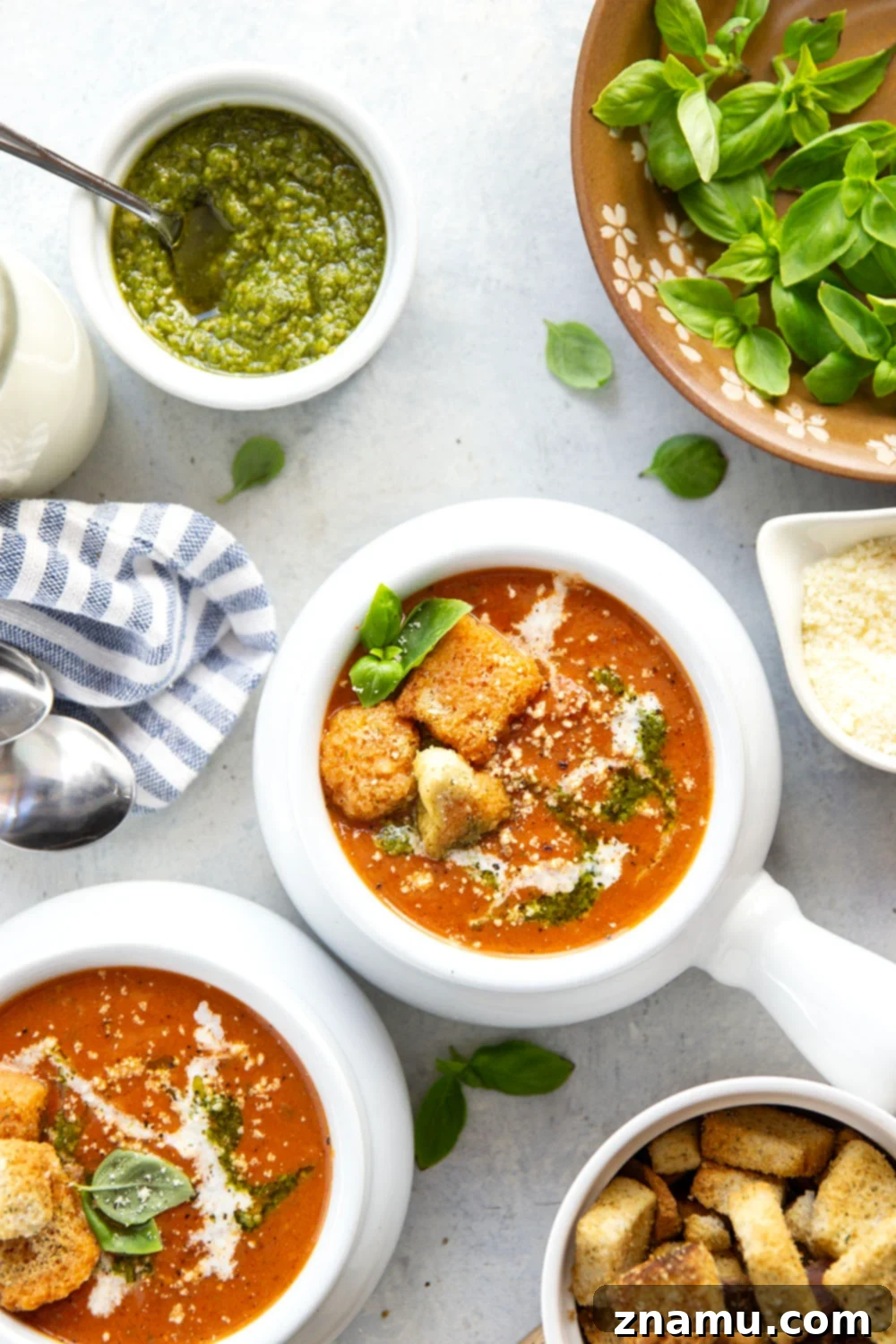 Vibrant Pesto Tomato Soup 3 Swirled with fresh basil pesto, this creamy pesto tomato soup is made completely from scratch and the ultimate grilled cheese sidekick!