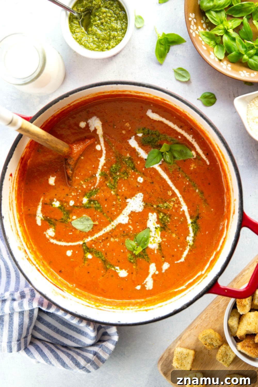 Vibrant Pesto Tomato Soup 5 Swirled with fresh basil pesto, this creamy pesto tomato soup is made completely from scratch and the ultimate grilled cheese sidekick!