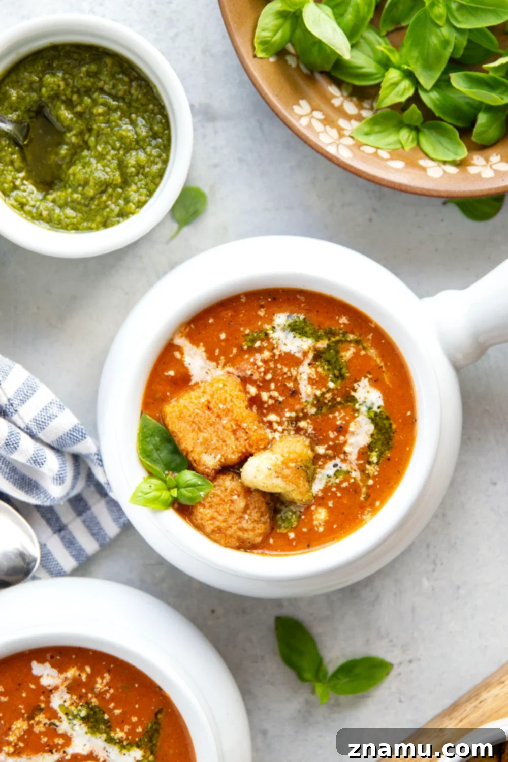 Vibrant Pesto Tomato Soup 6 Swirled with fresh basil pesto, this creamy pesto tomato soup is made completely from scratch and the ultimate grilled cheese sidekick!