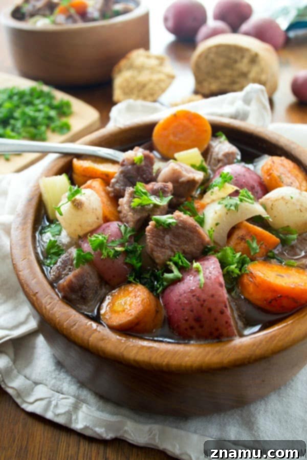Comforting Slow-Cooker Harvest Beef Stew 4 Serving of Slow Cooker Beef Stew with perfectly cooked vegetables and tender beef.