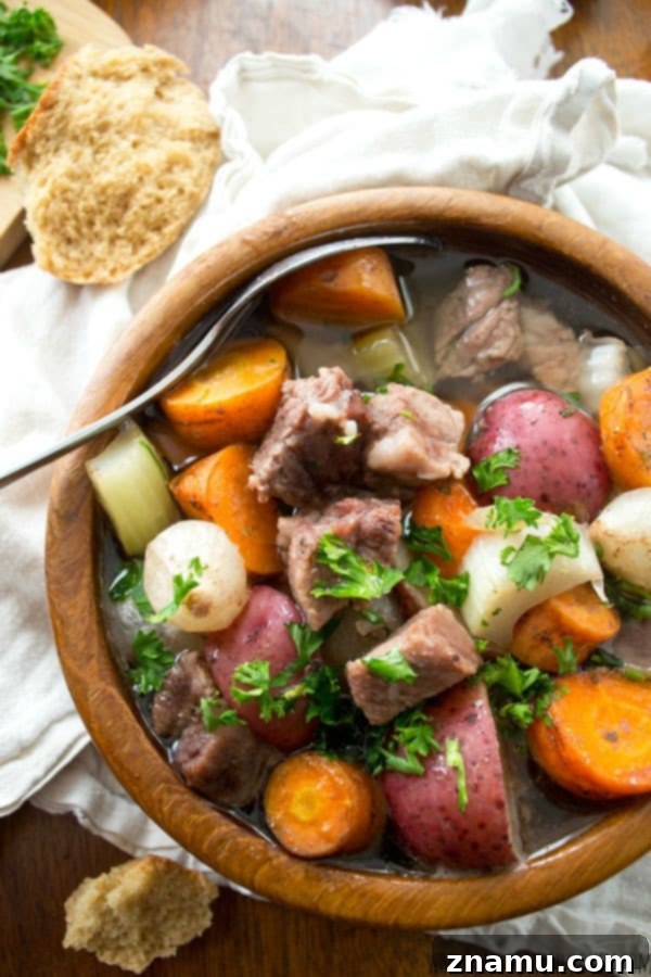 Comforting Slow-Cooker Harvest Beef Stew 5 Ingredients for slow cooker beef stew being prepared, highlighting fresh vegetables and beef cubes.