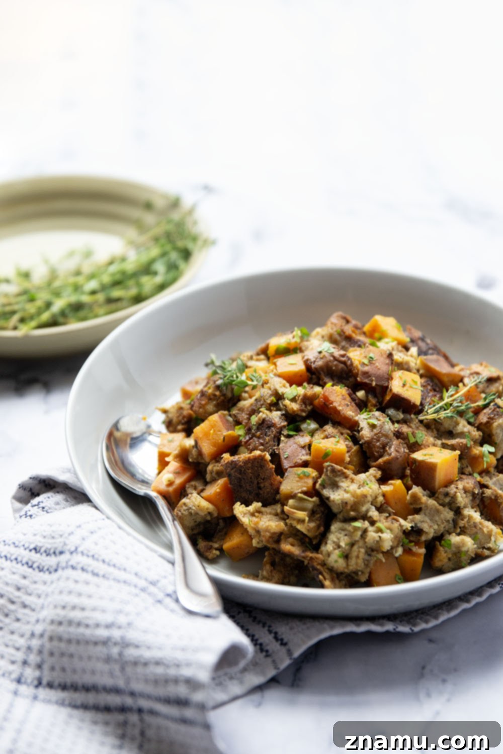 Autumn's Slow-Cooked Sweet Potato Stuffing 5 Uniformly cut sweet potato and dry bread cubes prepared for stuffing.