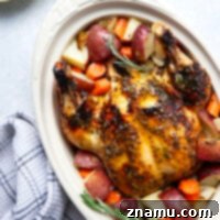 Honey Mustard Roast Chicken with roasted red potatoes and carrots.
